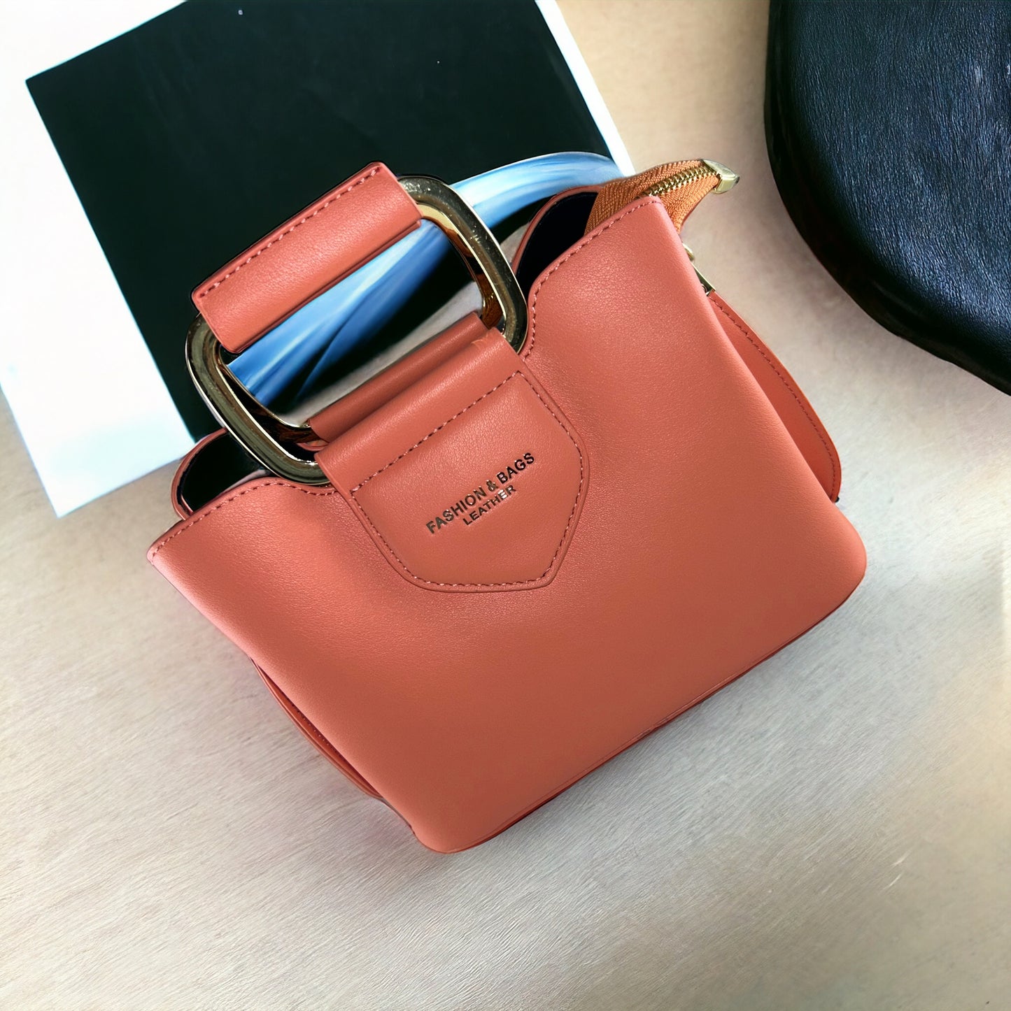 Kashpire | Mercer Crossbody Bucket Bag in Orange | L17